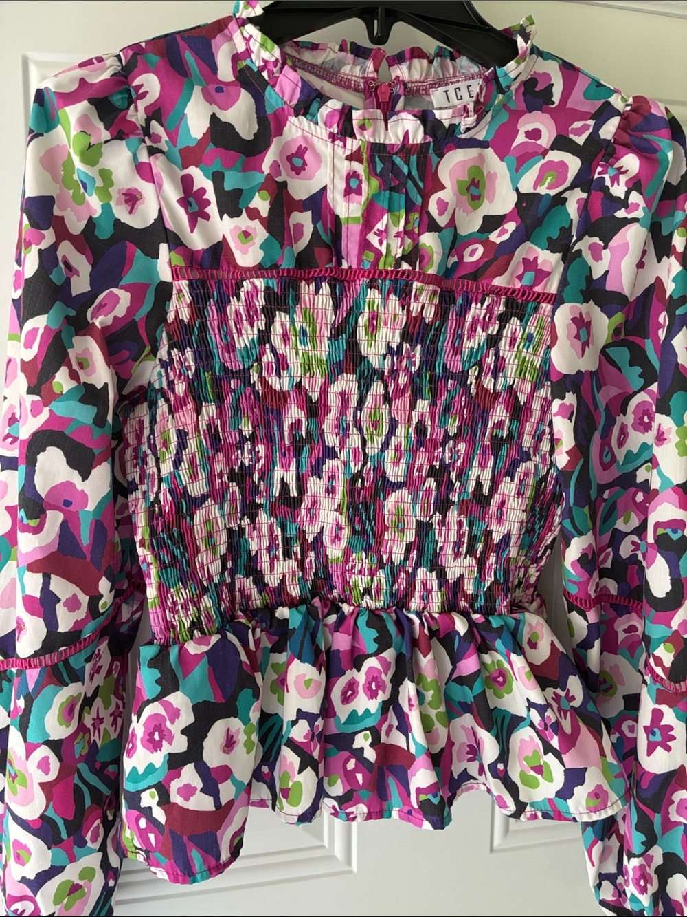 TCEC Pink Purple Teal Floral Smocked Peplum woman’s blouse